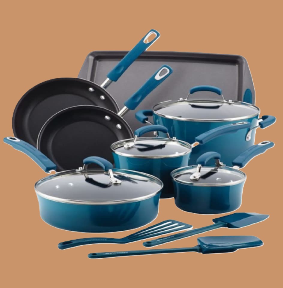 Curated household essentials including elegant dinnerware and kitchen utensils arranged on a modern kitchen counter by G&3J Designs
